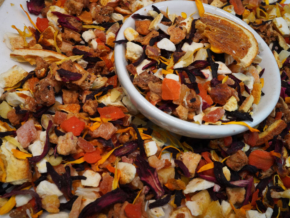 orange based fruit tea in a saucer