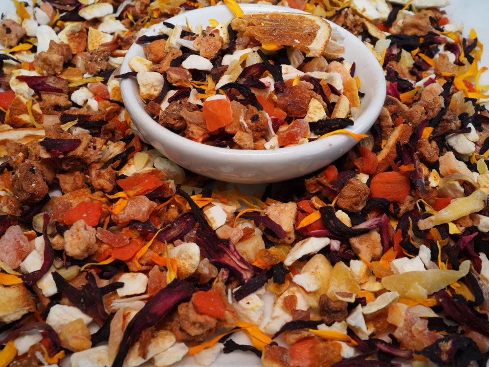 orange based fruit tea in a saucer